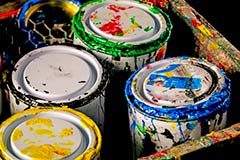 Photo of used paint cans.