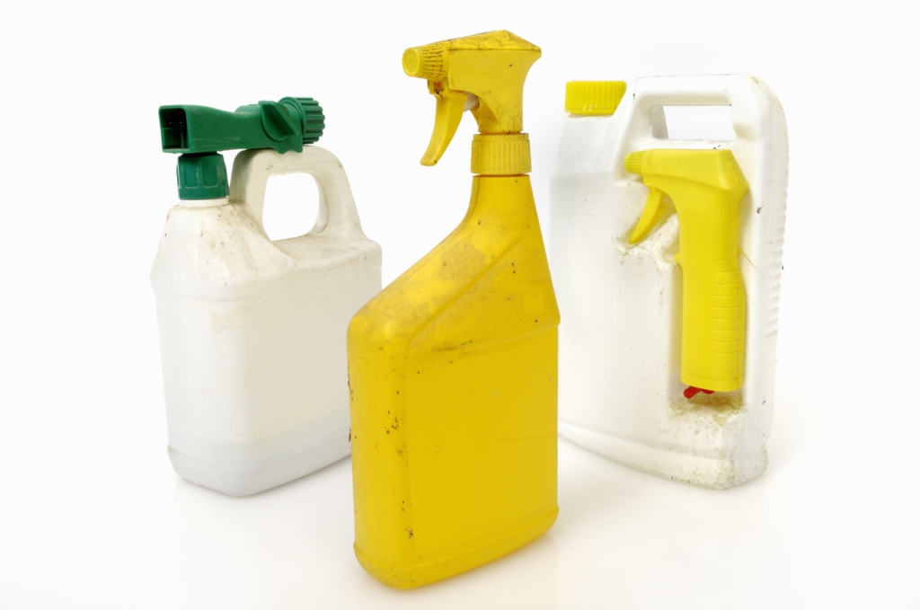 Old insecticide or pesticide containers.  Hazardous household chemicals requiring safe disposal.