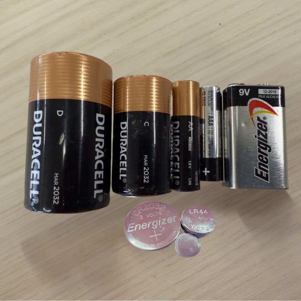 various single-use batteries, D, C, AA, 9 volt, button