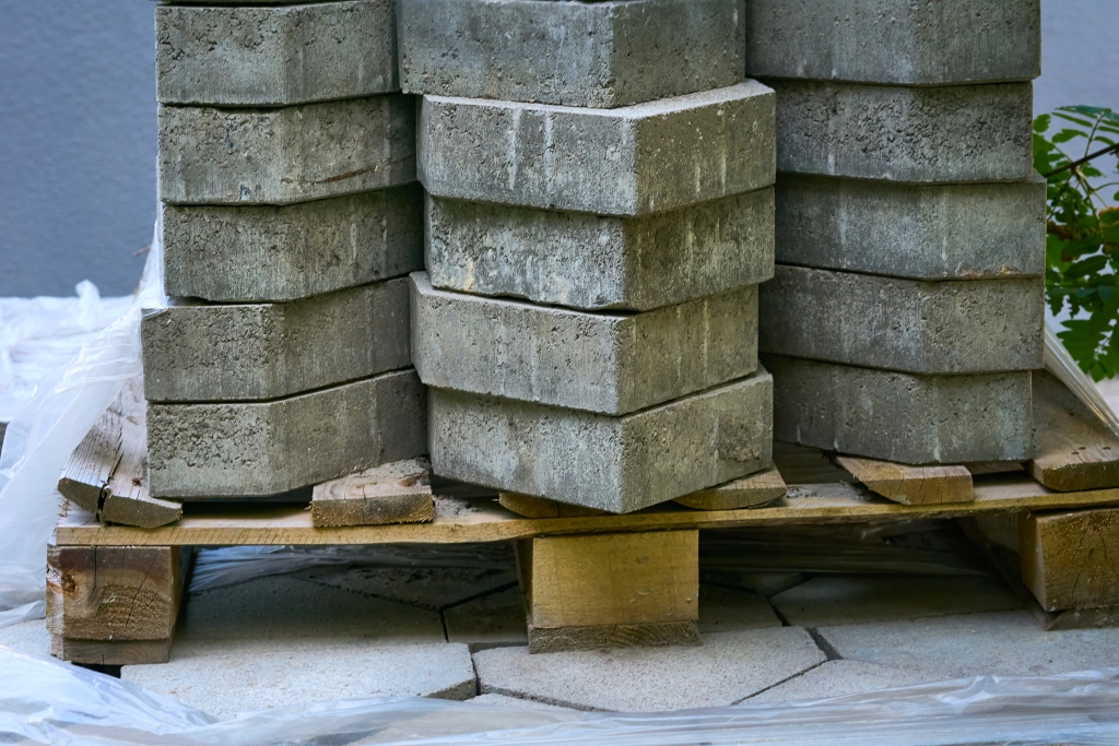 A pallet with loads of decorative masonry.